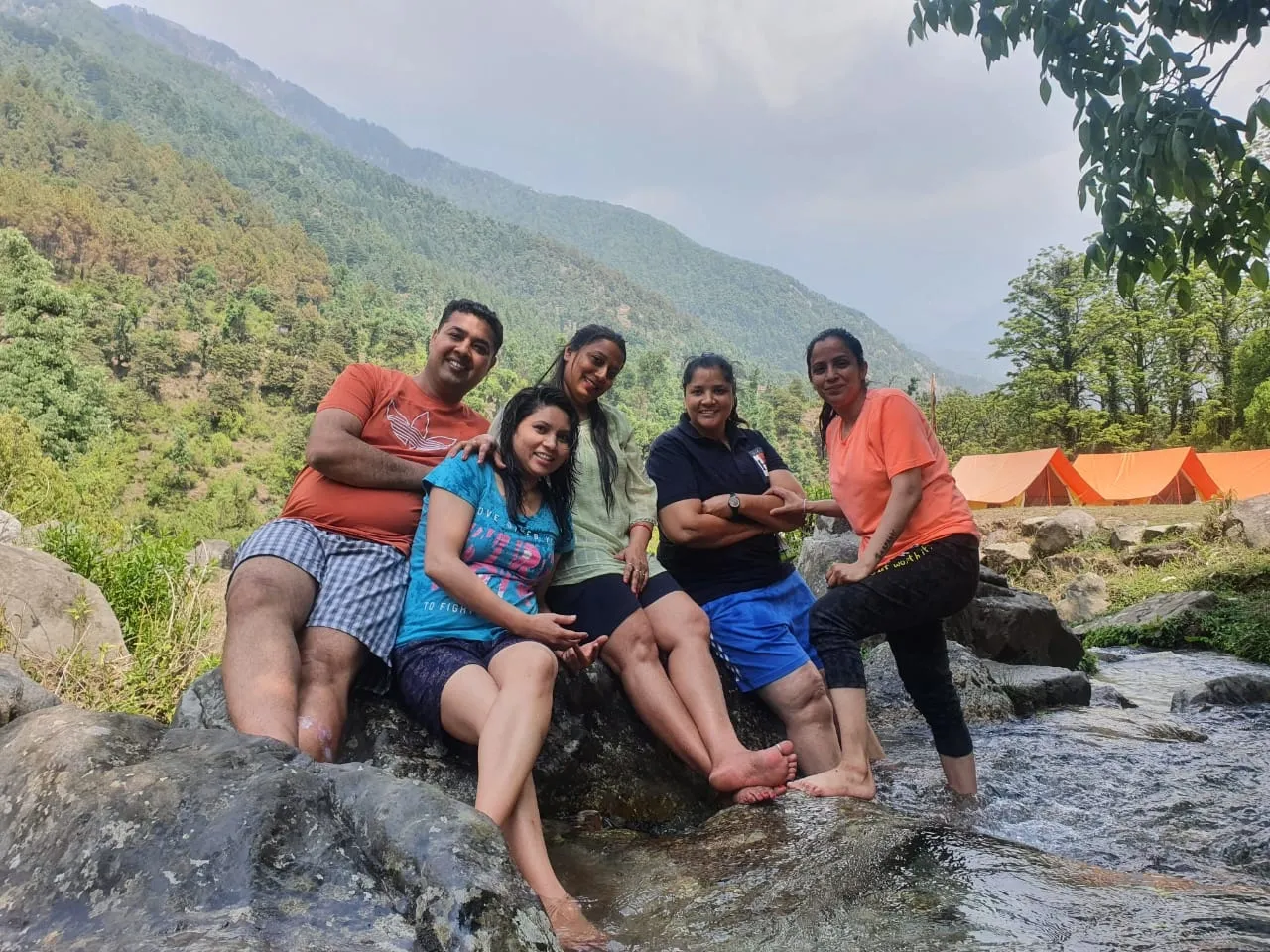 A family enjoying a mountain trip together