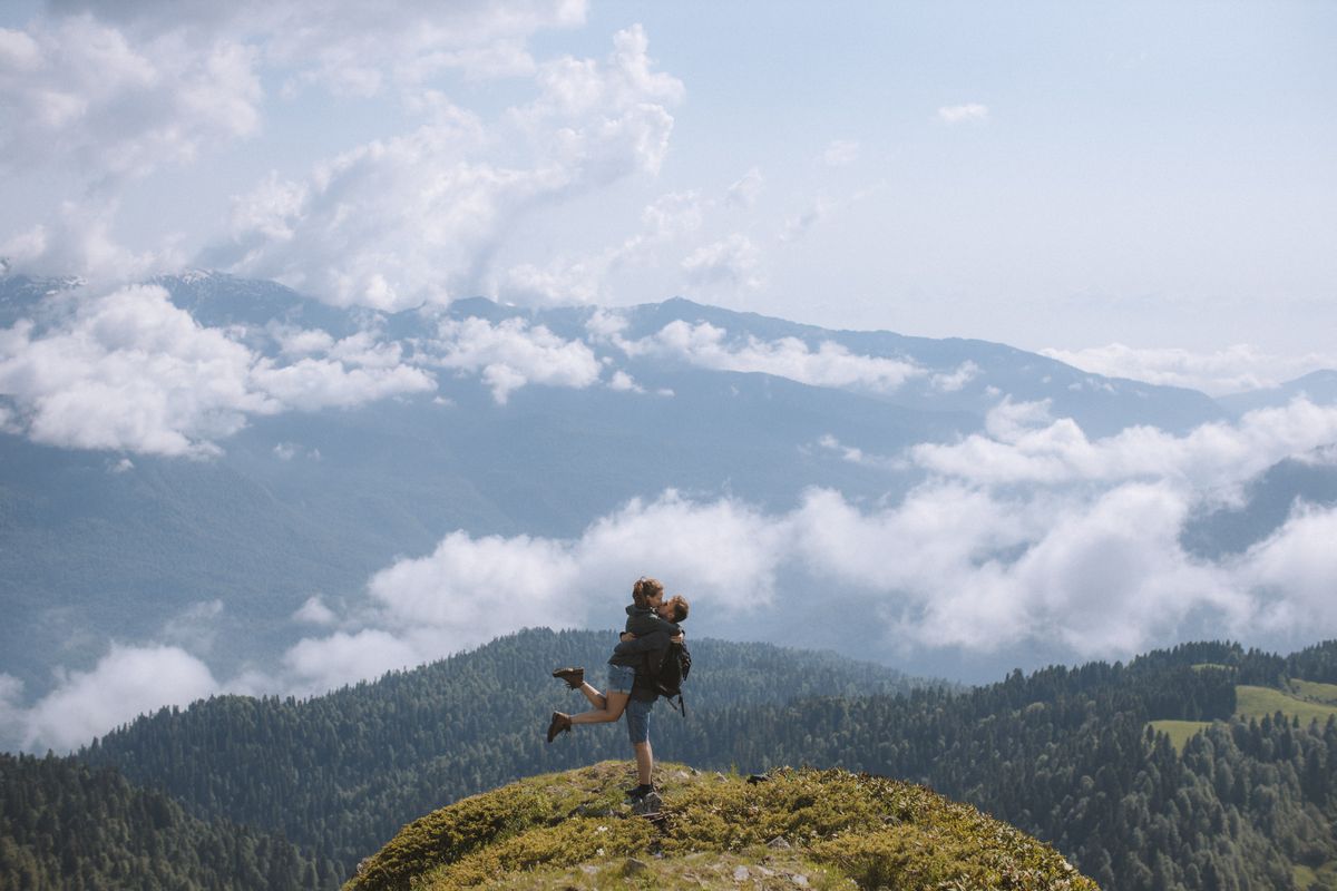Couple taking in a Himalayan mountain view