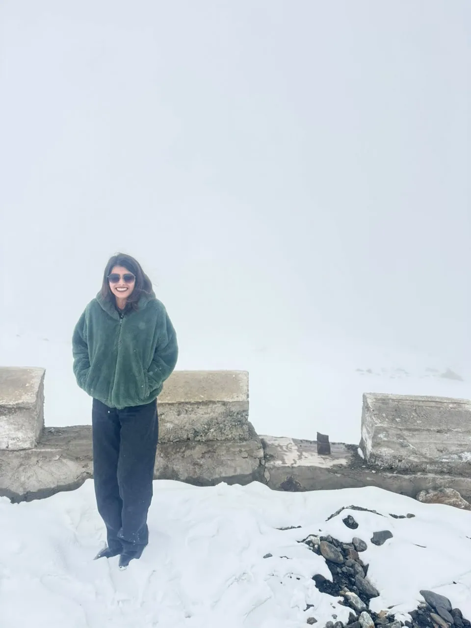 A traveller standing in a snow-covered landscape